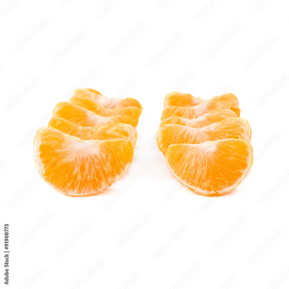 Slice sections of tangerine isolated over the white background Slice sections of tangerine isolated over the white background