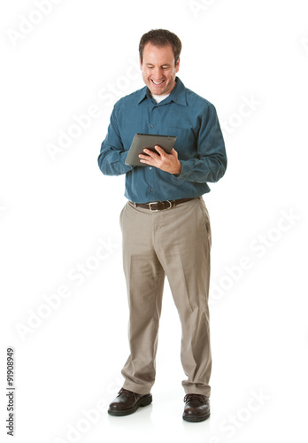 Doctor: Cheerful Man Using Tablet Computer