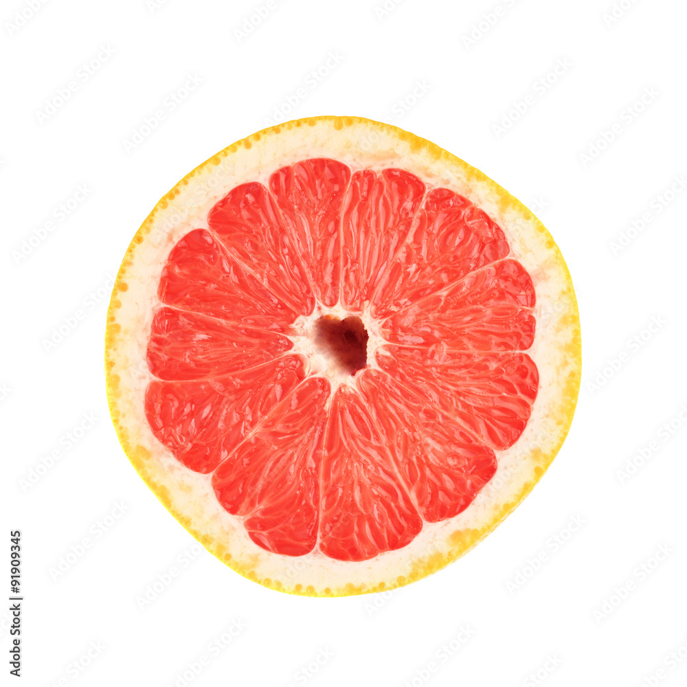 Single ripe grapefruit cut in half isolated over the white Single ripe grapefruit cut in half isolated over the white