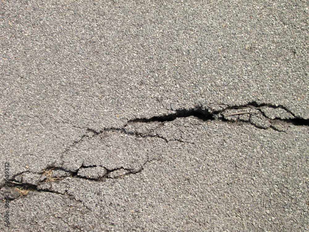 Obraz premium cracked asphalt background