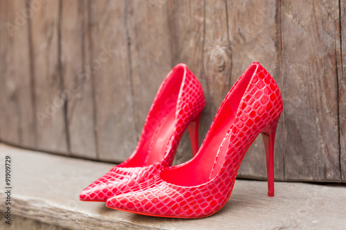 Pair of red high heel shoes