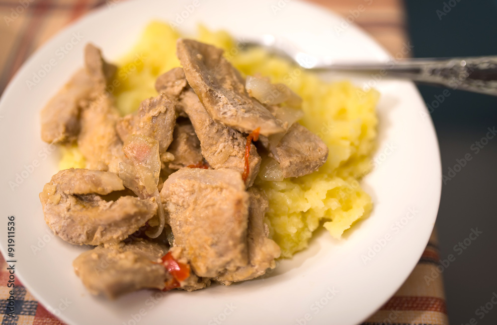 Meat with mashed potato. Selective focus.