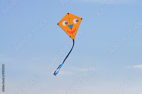Kite flying in a blue sky
