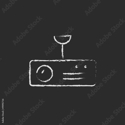 Digital projector icon drawn in chalk.
