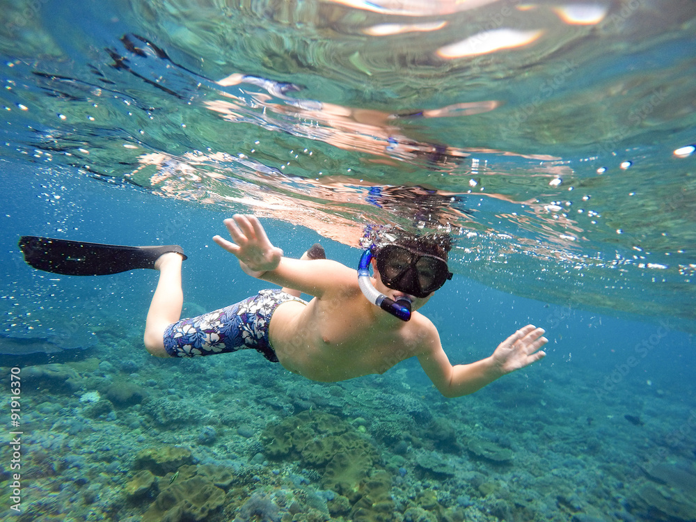 Underwater shoot of a young boy snorkeling