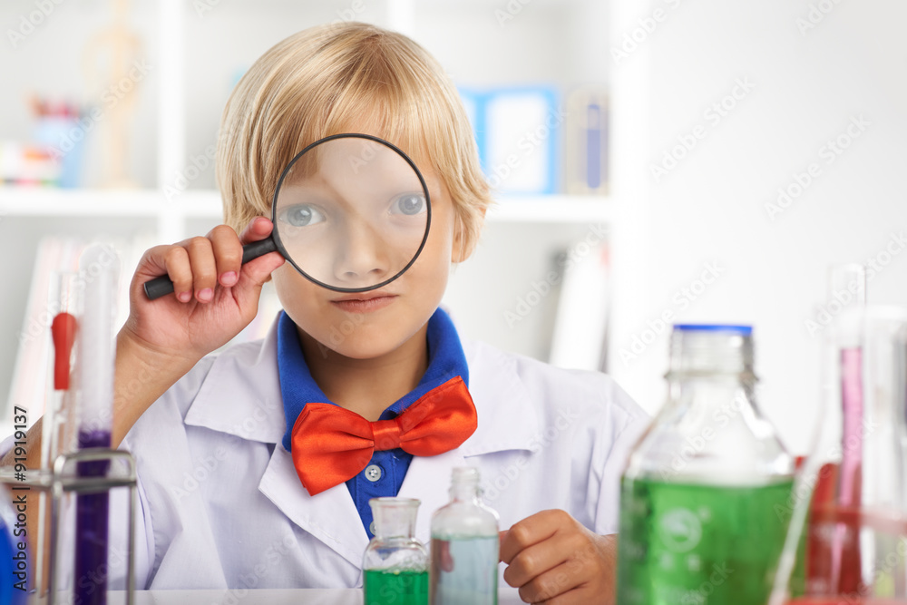 Looking through magnifying glass Looking through magnifying glass
