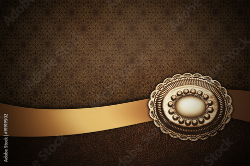 brown background with pattern and golden ribbon