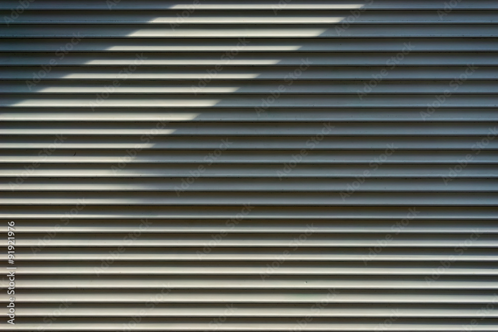 Fototapeta premium Shadows on the rhythmic surface striped
