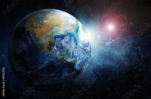 Fototapeta Naklejka Na Ścianę i Meble -  Earth and galaxy. Elements of this image furnished by NASA.