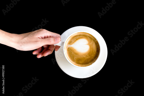 hand  holding white coffee cup
