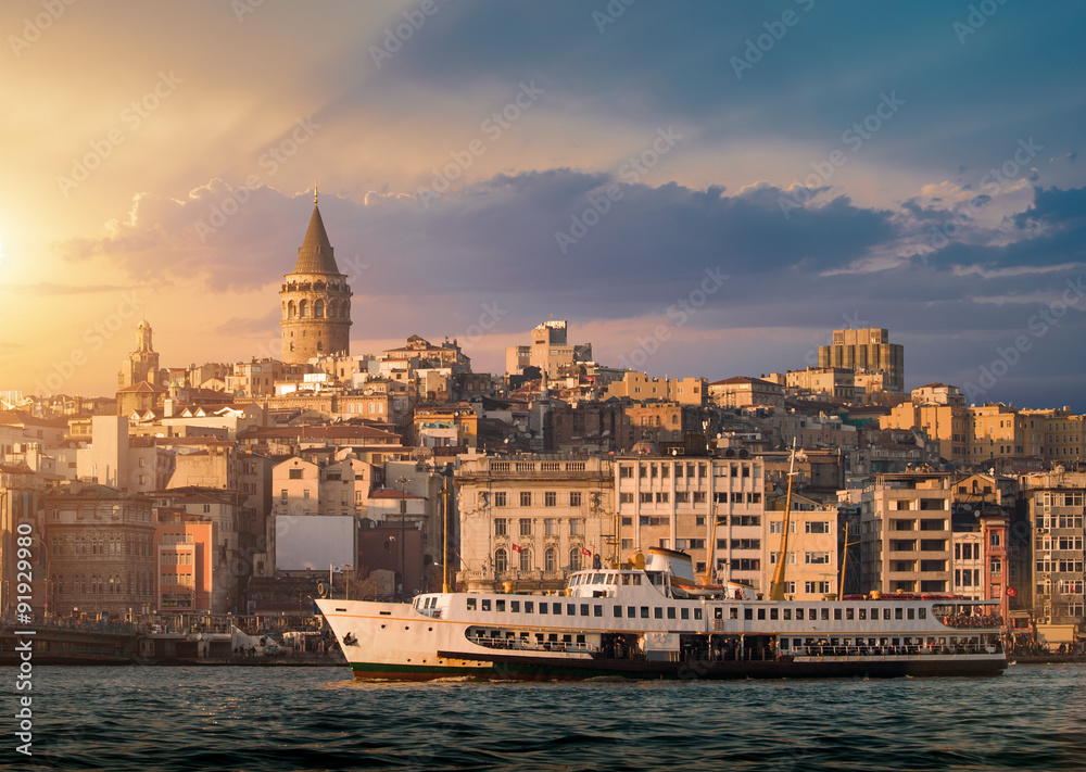 Iconic view of Istanbul with Galata Tower and the ferry