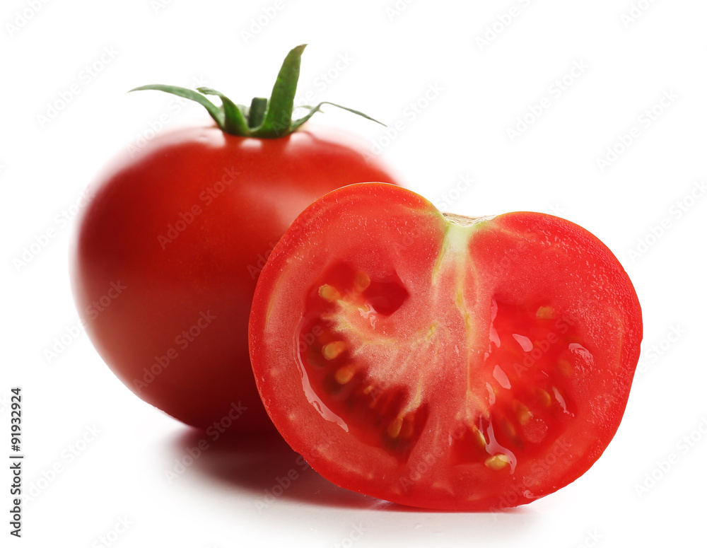 Whole and cut tomatoes isolated on white Whole and cut tomatoes isolated on white