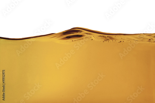 Yellow liquid with bubbles photo