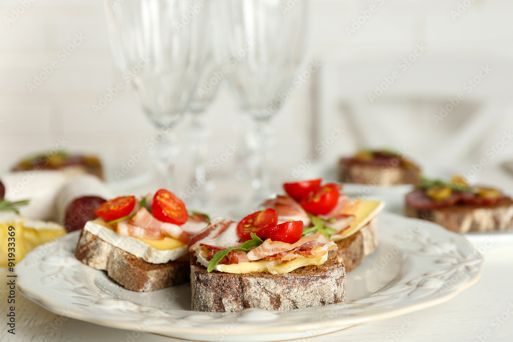 Tasty sandwiches on plate, close up Tasty sandwiches on plate, close up