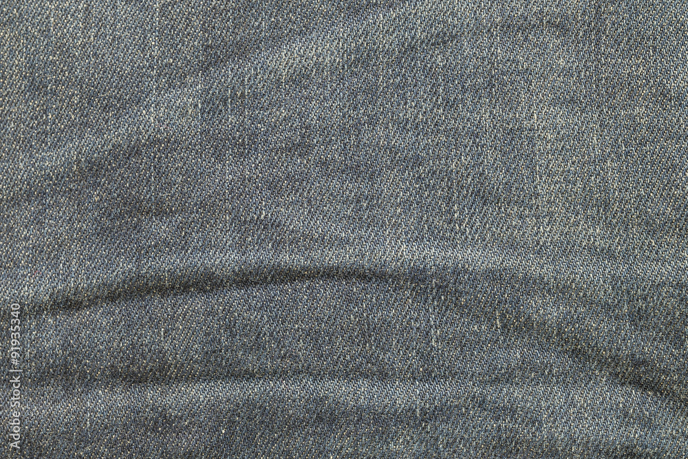 Closeup old jean trousers fabric texture background Closeup old jean trousers fabric texture background