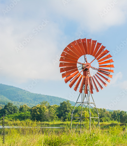 red wind turbine generator