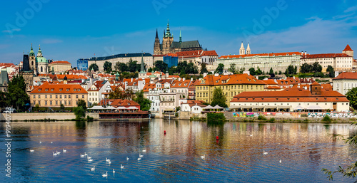 View of colorful old town and Prague castle with river Vltava  C