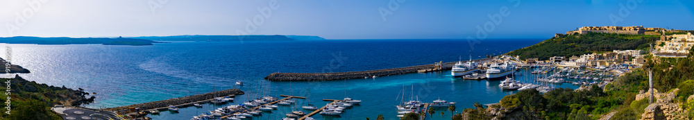 Panorama view on Mgarr port with ferry on Gozo island, Malta.