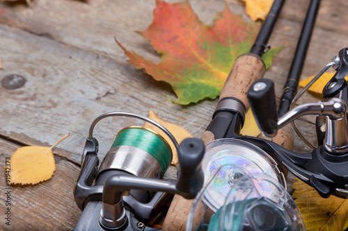 fishing tackles on board with leafs autumn