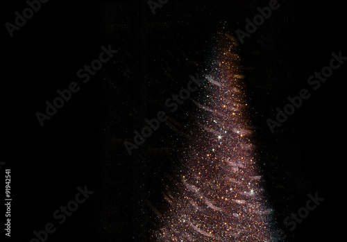 abstract image of bokeh light burst and textures. abstract Christmas tree shape siluete photo