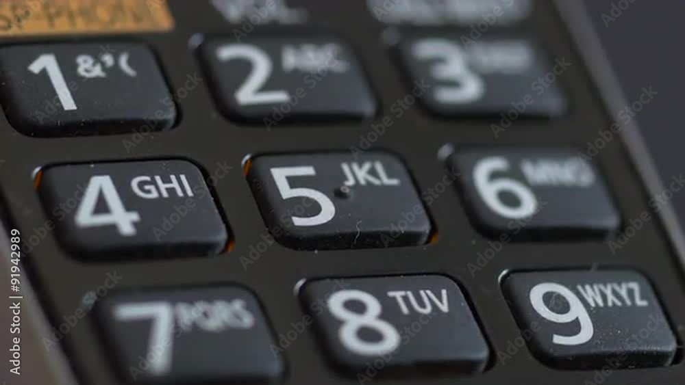 Extreme close up of a touch tone cordless phone keypad dialing 911 emergency call. Extreme close up of a touch tone cordless phone keypad dialing 911 emergency call.