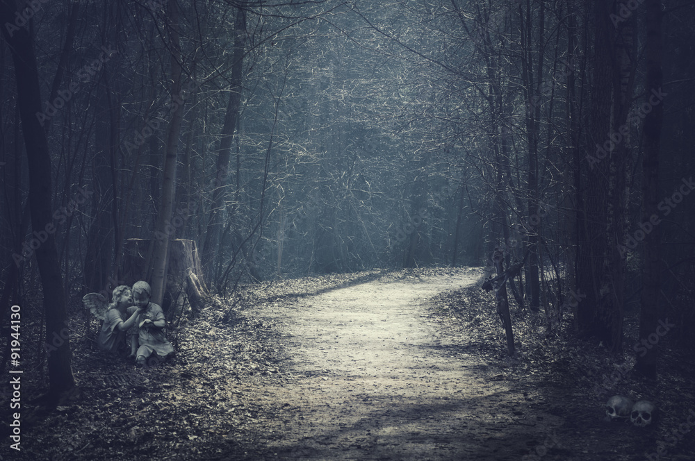 Fototapeta premium Halloween landscape. Dark forest with empty road