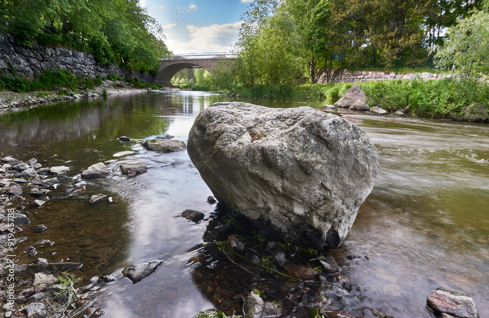 Rock in Vanhankaupunginkoski river, Helsinki, Finland