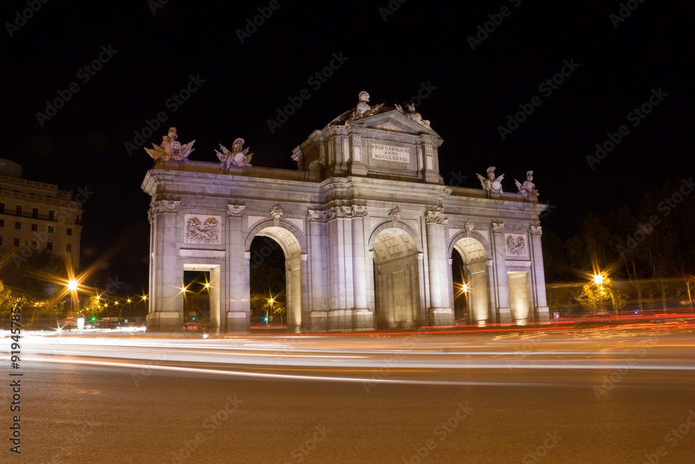 Puerta de Alcalá. / The Puerta de Alcalá is one of five former royal doors giving access to the city of Madrid (Spain). It is located in the center of the roundabout at the Plaza de la Independencia.