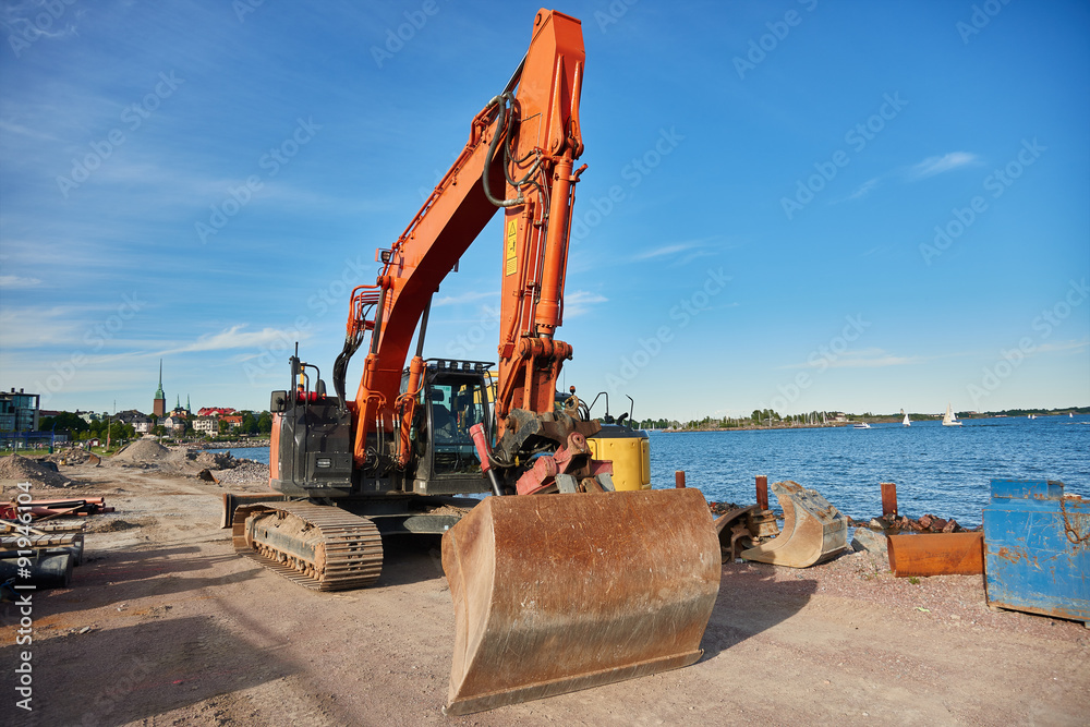 Excavators in construction site