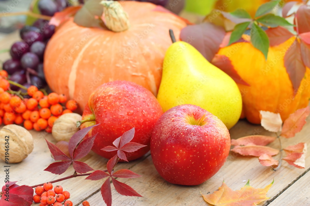 Autumn still life with assorted fruit, vegetables, berries and nuts Autumn still life with assorted fruit, vegetables, berries and nuts