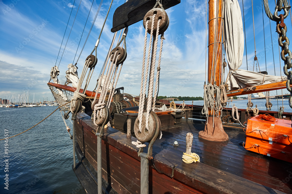 Old wooden sailing ship in harbour