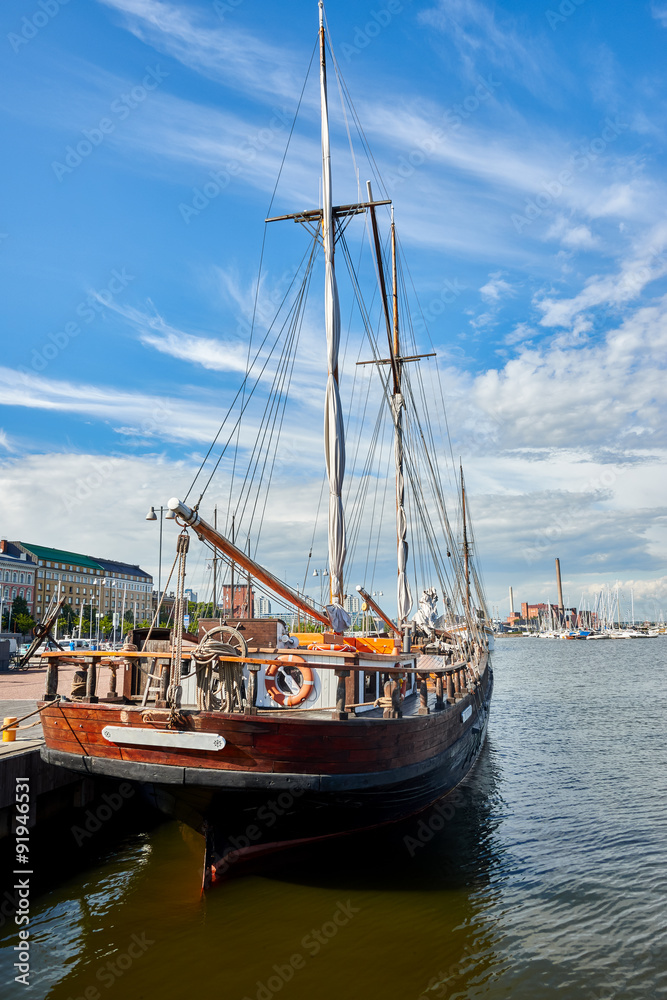 Old wooden sailing ship in harbour