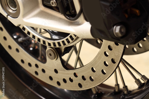 Motorbike disc brakes wheel. Close-up of the disc brakes on a motorcycle.