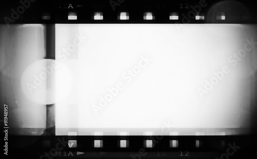 retro color film strip with spotlight background and texture