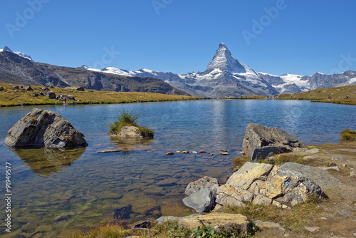 gorgeous summer landscape with mountain lake in the Swiss Alps