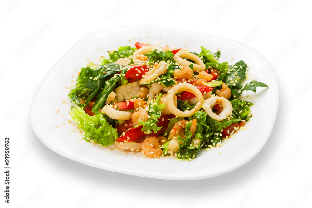 Restaurant food isolated - seafood salad with calamari rings Restaurant food isolated - seafood salad with calamari rings