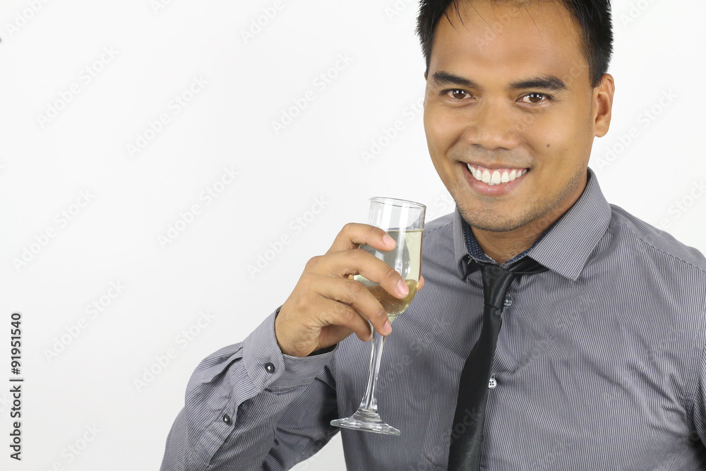 the new year - young filipino with a champagne flute the new year - young filipino with a champagne flute