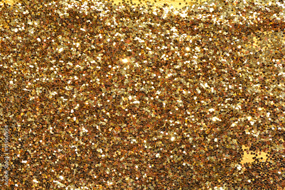 Gold sand and dust texture. Golden sparkling glitter background. Gold sand and dust texture. Golden sparkling glitter background.