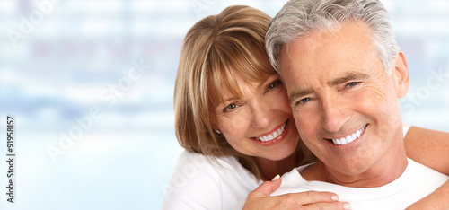 Elderly couple with white teeth. photo