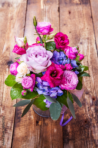 flowers. bouquet of roses on a wooden background