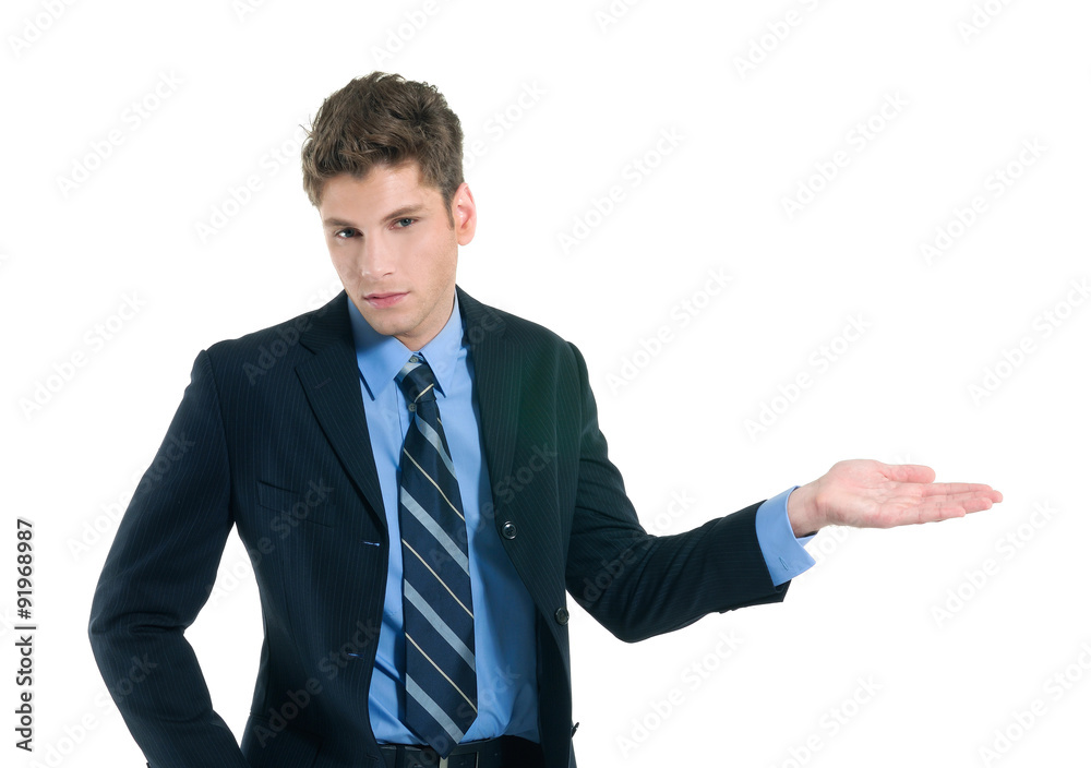 Showing, giving or presenting - Portrait of a young business man. with his hand outstretched, Showing, giving or presenting - Portrait of a young business man. with his hand outstretched,