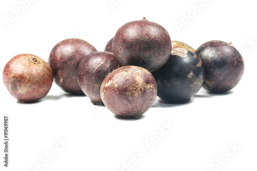 Flacourtia fruit over white background
 photo