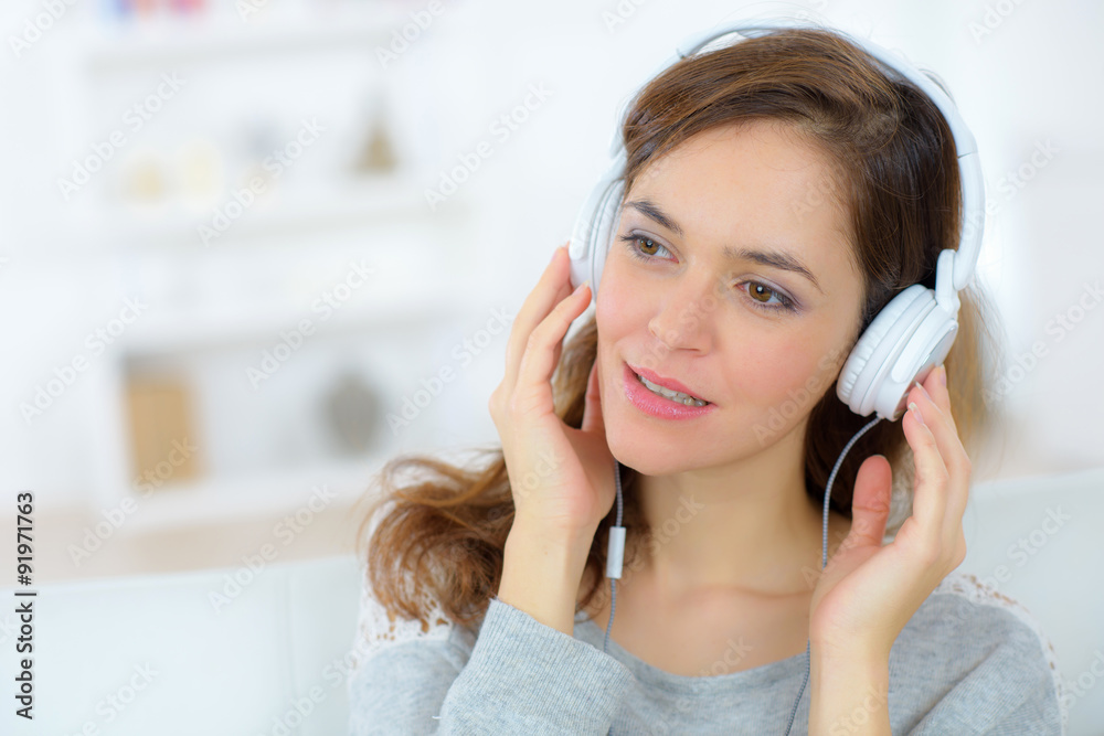 Naklejka premium Chilling out to music at home