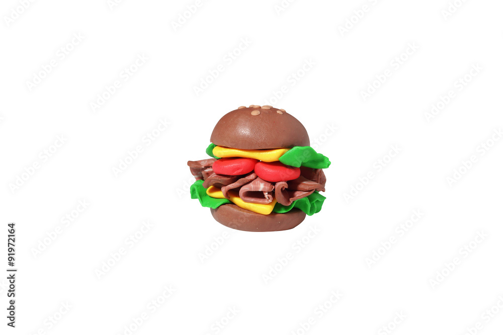 miniature cheese burger model from japanese clay on white background miniature cheese burger model from japanese clay on white background
