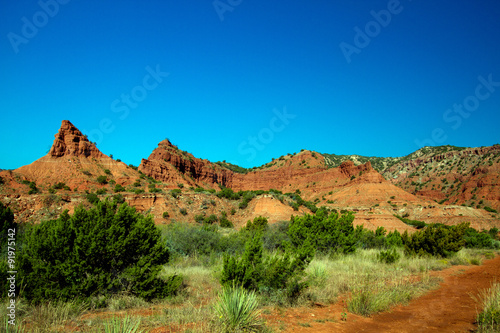 Dramatic geological formations at Caprock Canyons State Park in Texas photo