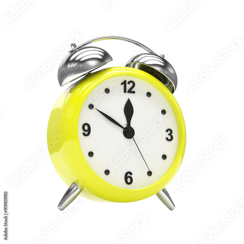 Yellow alarm clock on white