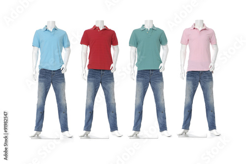 Four male mannequin dressed in jeans with colorful t-shirt 