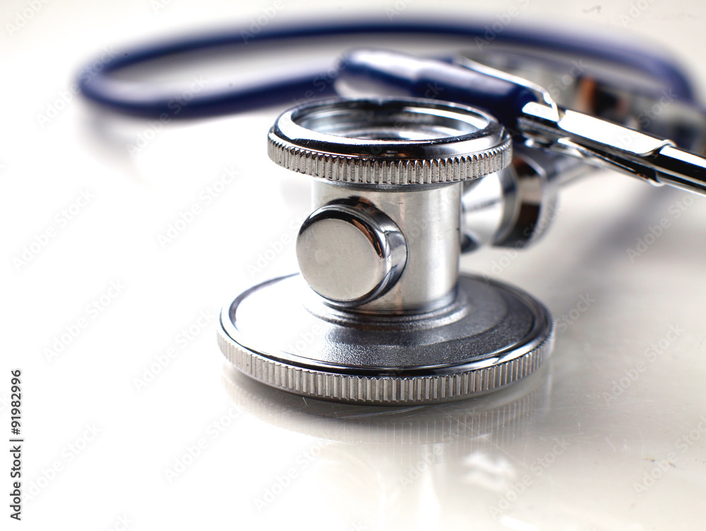 Medical stethoscope in white background