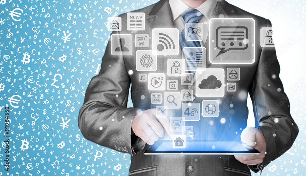 Business man using tablet PC with social media icon set Business man using tablet PC with social media icon set
