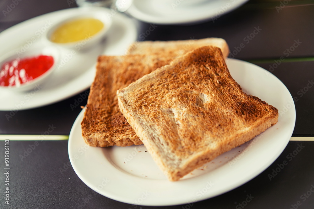 Toast, jam, served with set breakfast. Toast, jam, served with set breakfast.